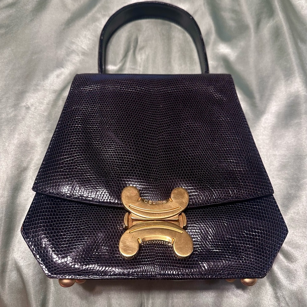 Elegant Black Handbag with Gold Accent